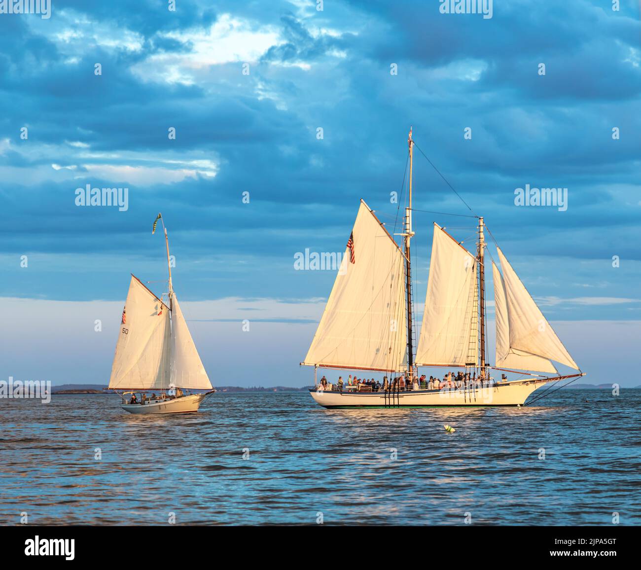 Two sail boats under sail in Camden Maine Stock Photo