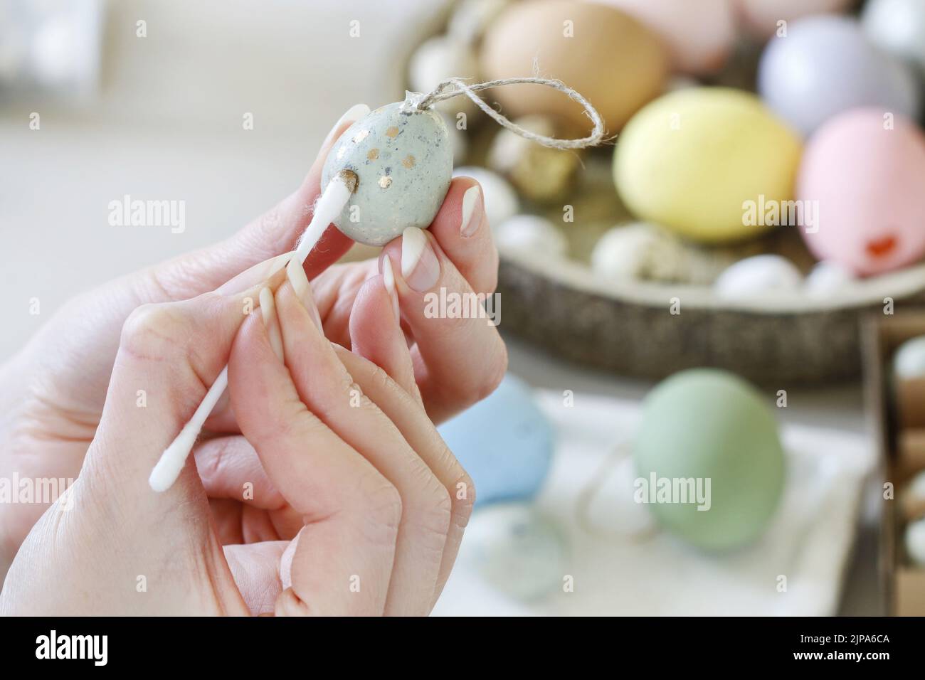 How to make hanging Easter eggs. Step by step, tutorial. Festive decor Stock Photo