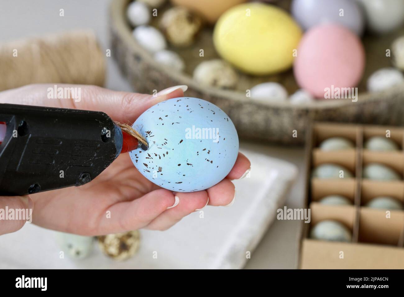 How to make hanging Easter eggs. Step by step, tutorial. Festive decor Stock Photo