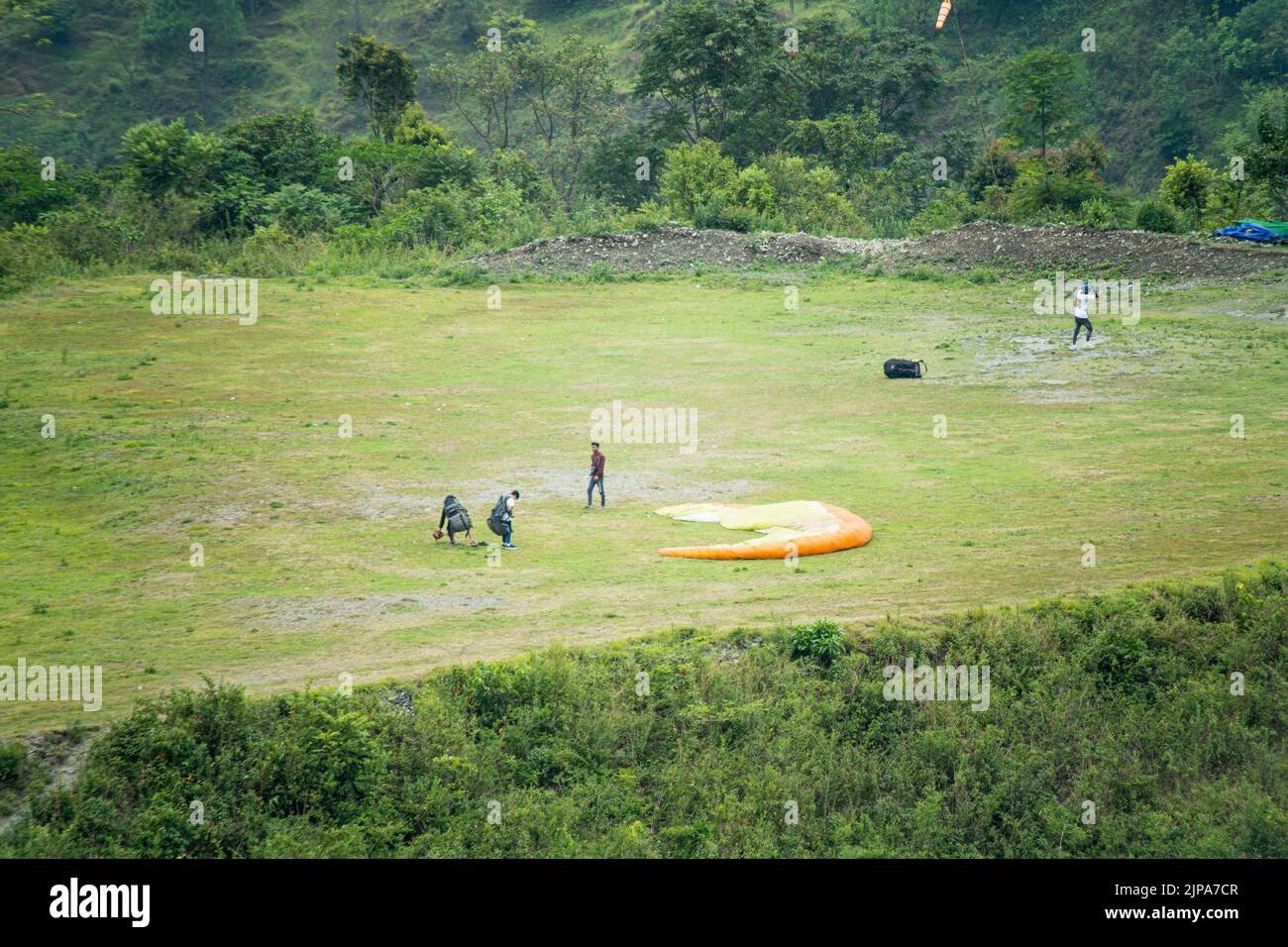 landing site for para gliding people with folded parachute ground