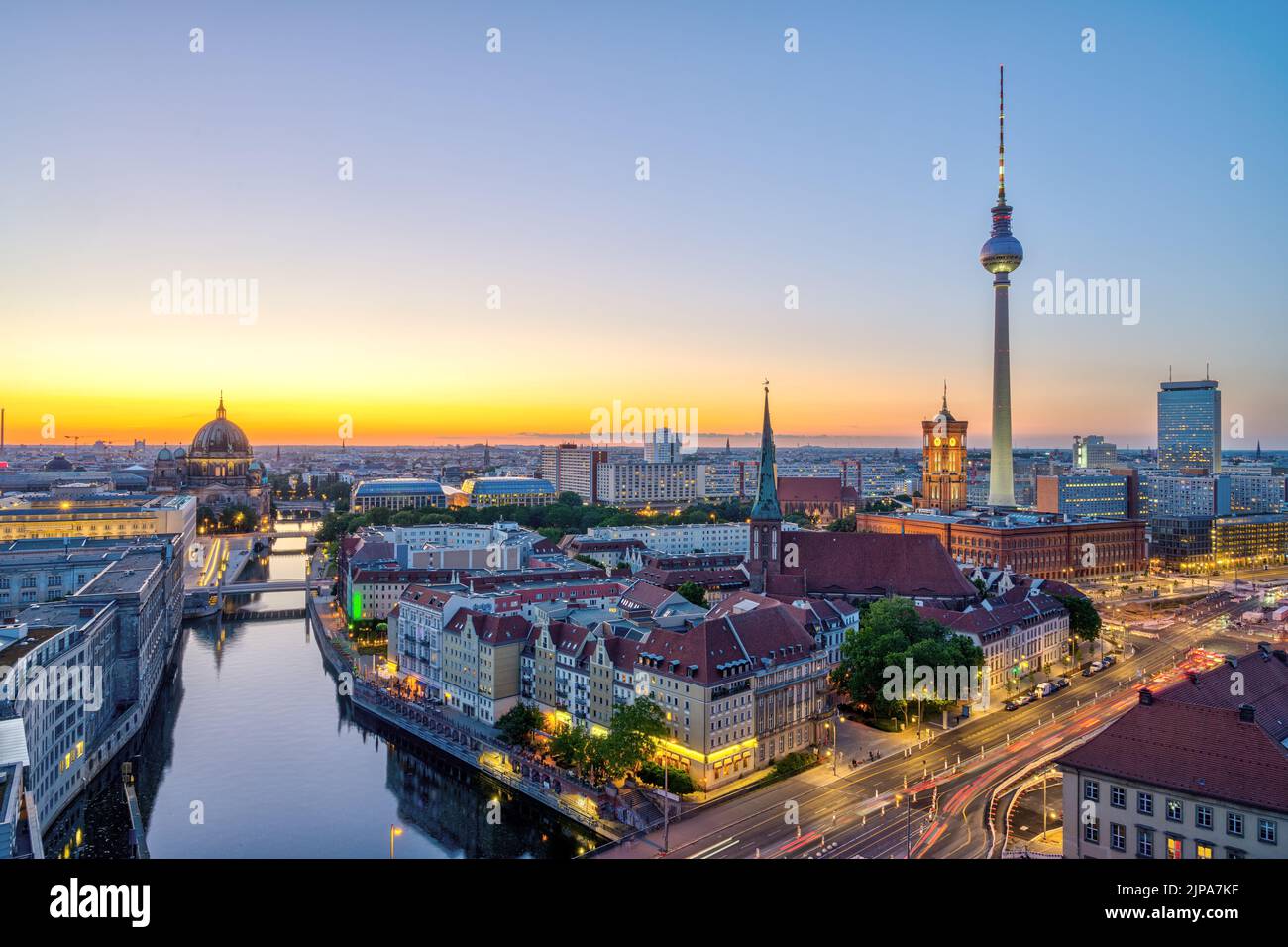 Downtown Berlin after sunset with the TV Tower, the river Spree and the cathedral Stock Photo