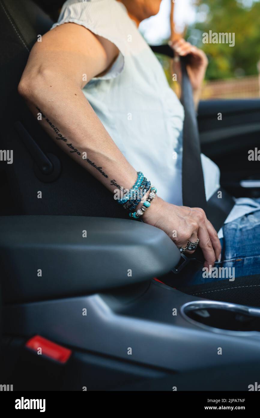 One woman holding belt hires stock photography and images Alamy