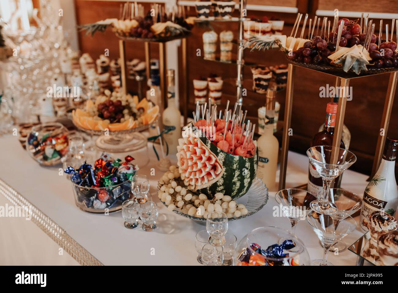stylish desserts with strawberry, candy bar with sweets at luxury