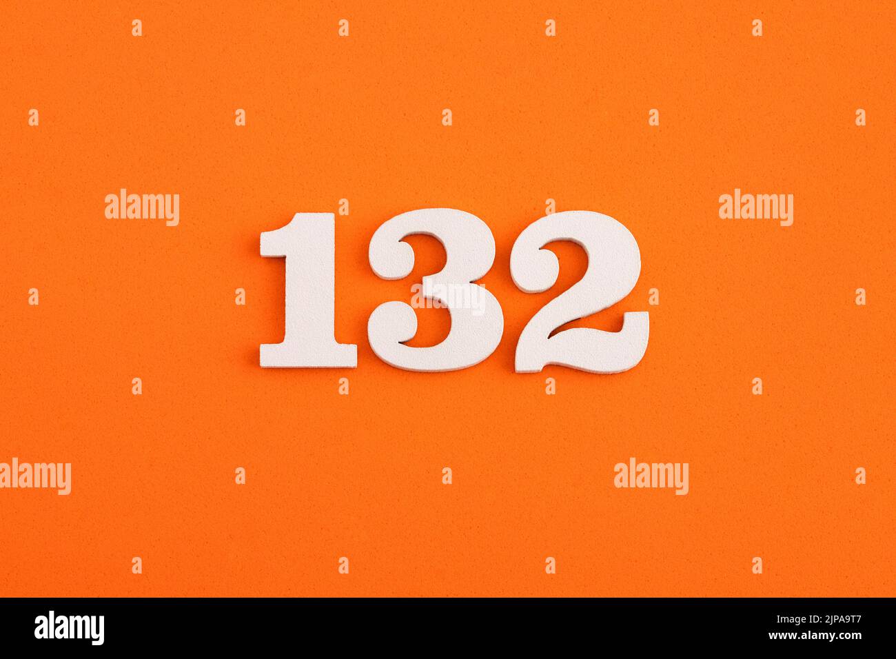 Number 132 - On orange foam rubber background Stock Photo - Alamy