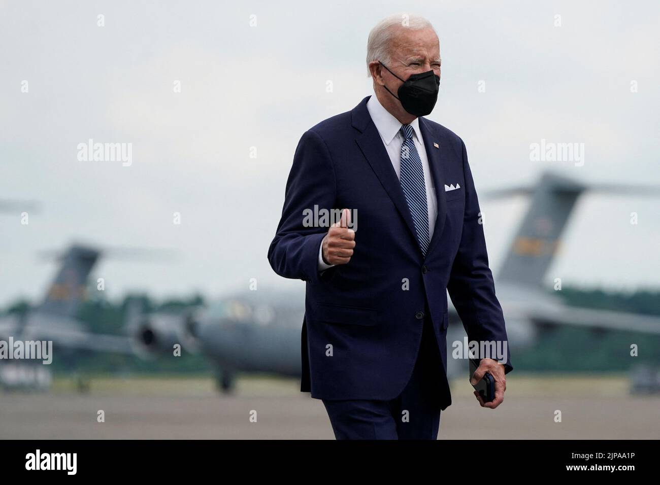 U.S. President Joe Biden walks to Air Force One as he departs for Washington, D.C., from Joint Base Charleston, South Carolina, U.S., August 16, 2022. REUTERS/Joshua Roberts Stock Photo