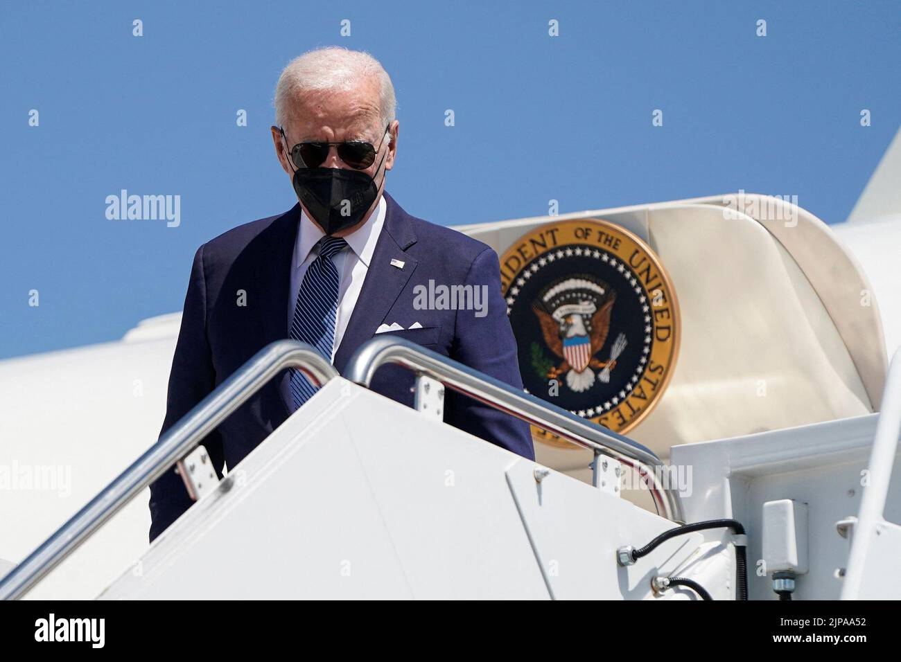 U.S. President Joe Biden walks from Air Force One as he returns from Kiawah Island, South Carolina, at Joint Base Andrews in Maryland, U.S., August 16, 2022.      REUTERS/Joshua Roberts Stock Photo