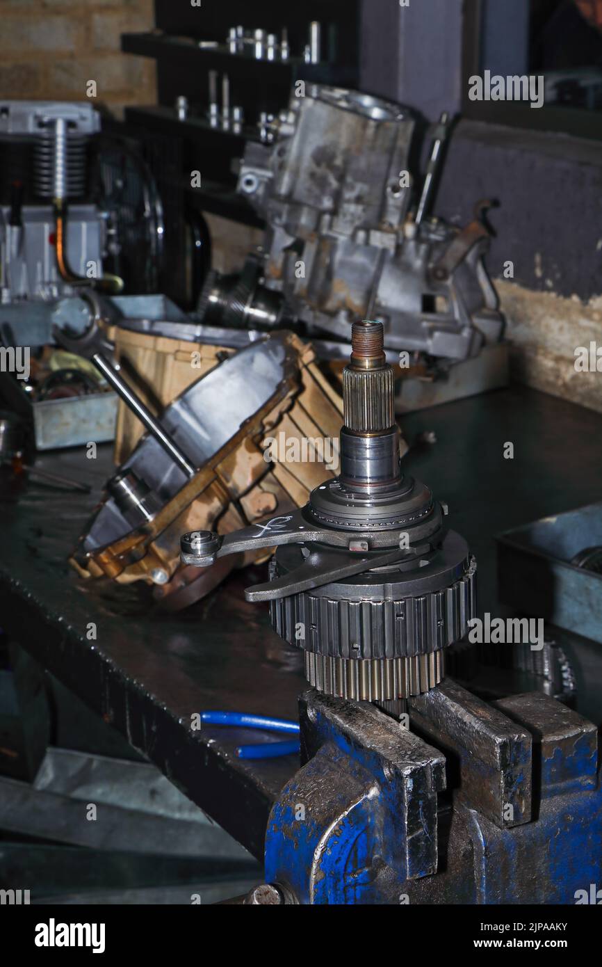 Engine Gear Assembly On Workshop Bench Vice Stock Photo
