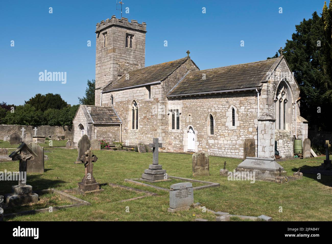 dh St Andrews Church NEWTON KYME YORKSHIRE English country churches exterior building in churchyard graveyard britain Stock Photo