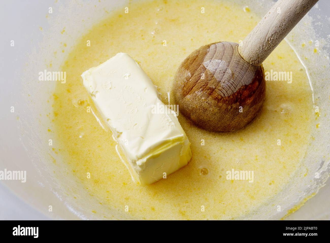 Preparing the butter and eggs for baking the cake Stock Photo Alamy