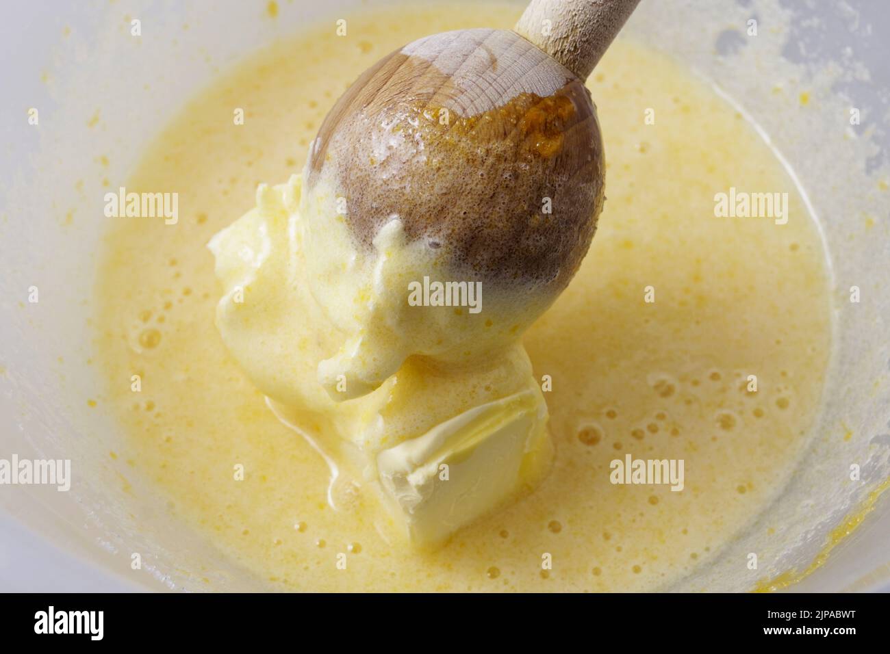Preparing the butter and eggs for baking the cake Stock Photo Alamy
