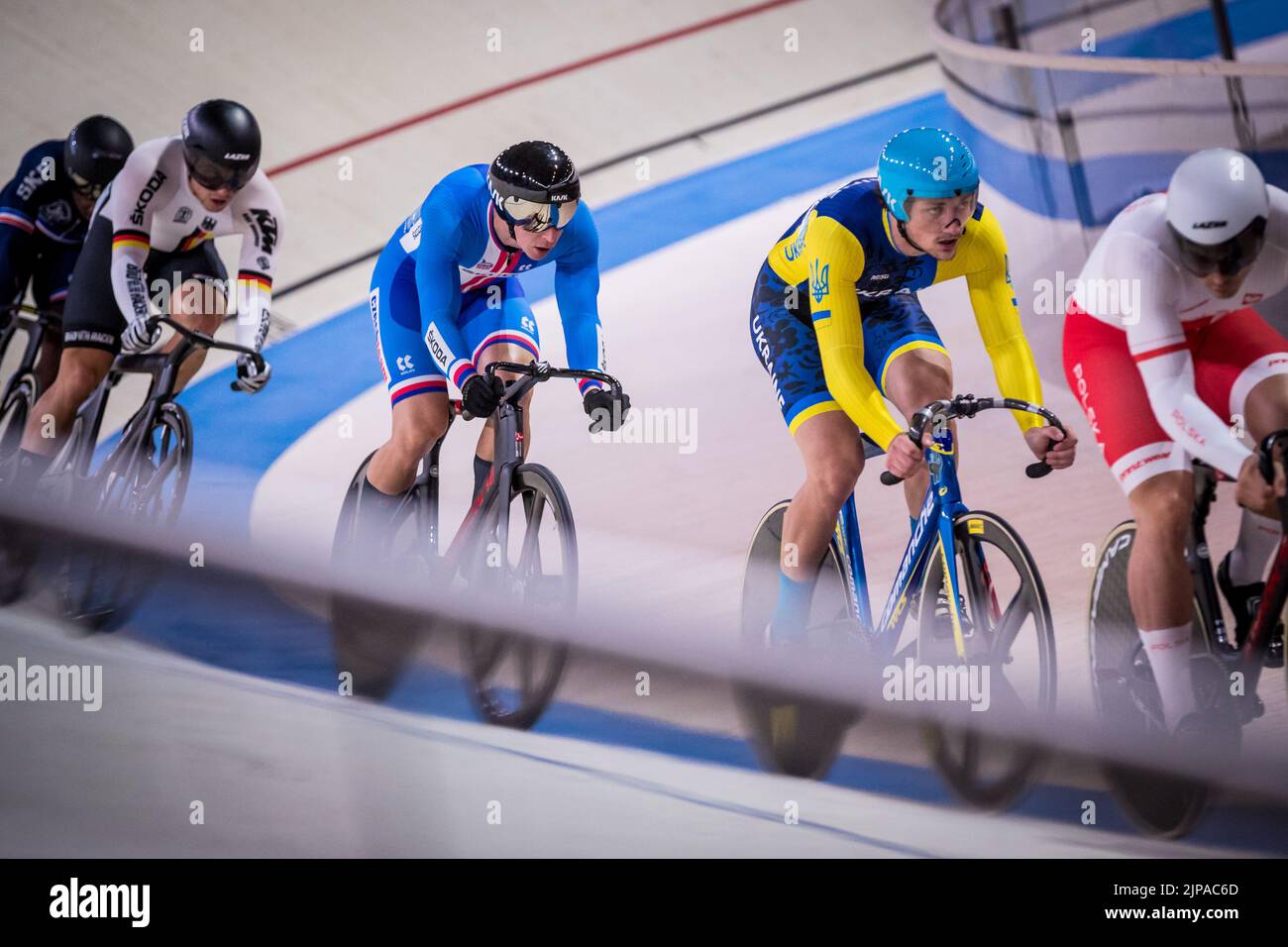 Tomas Babek of Czech Republic, center, competes at men's Keirin quarterfinal during the European Cycling Championships in Munich, Germany, August 16, Stock Photo