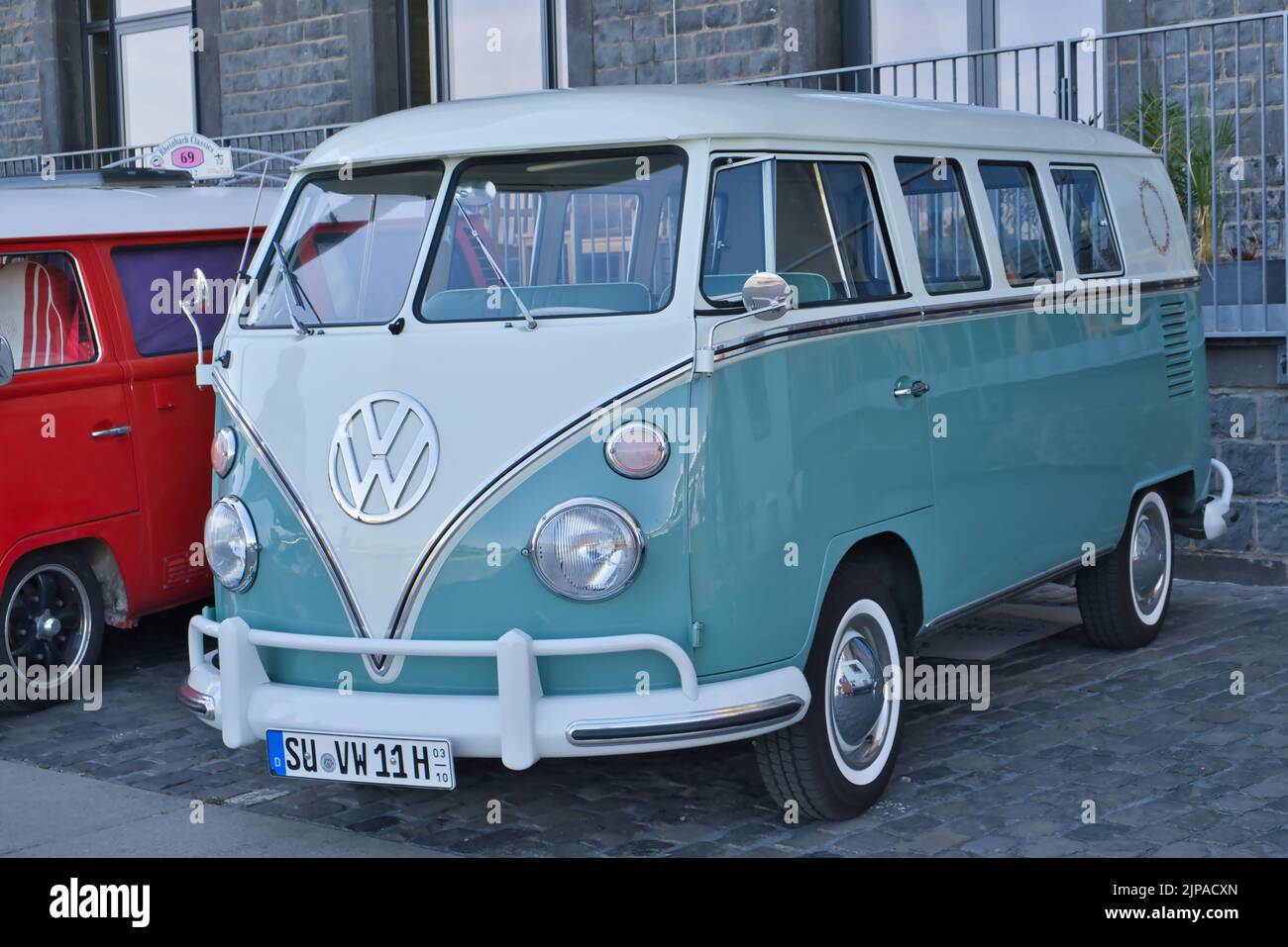 Volkswagen, VW bus from the sixties at the oldtimer exhibition in Cologne, Germany, diagonal front view Stock Photo