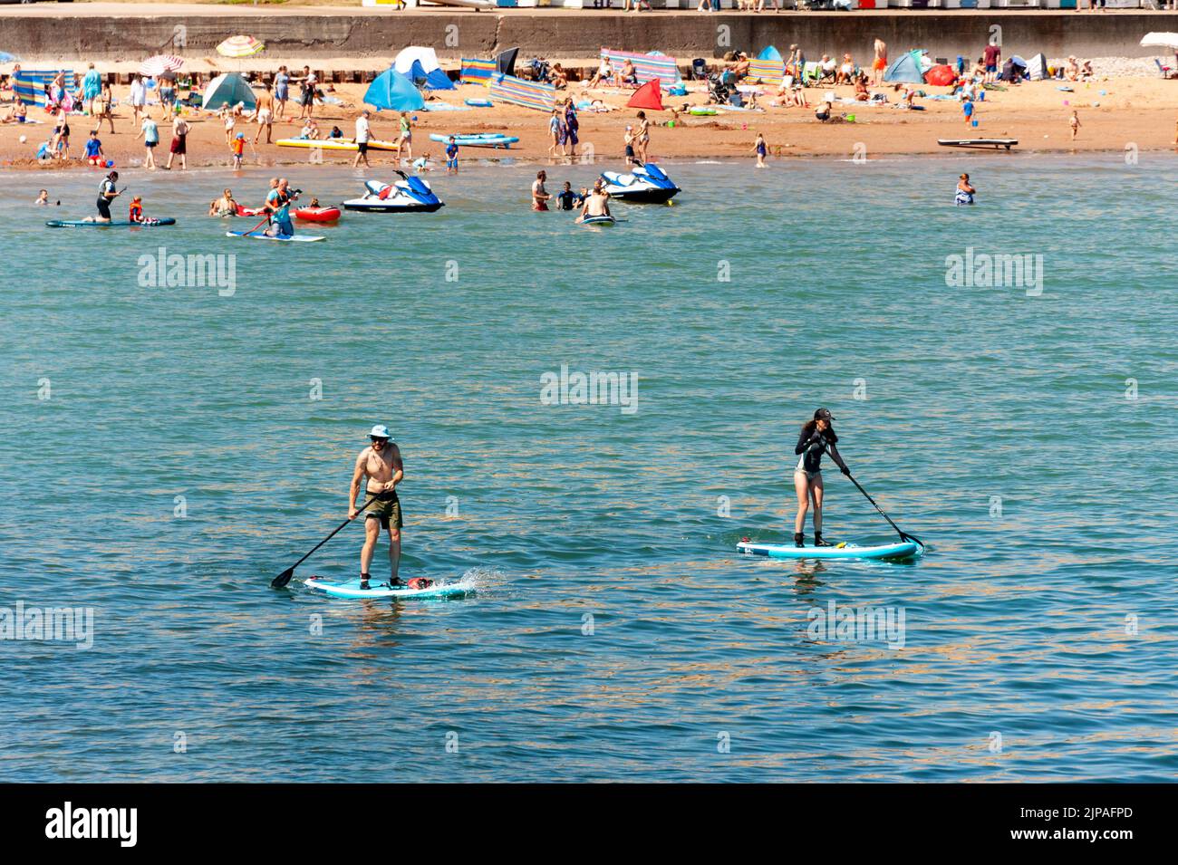 Beach paddle boards hires stock photography and images Alamy