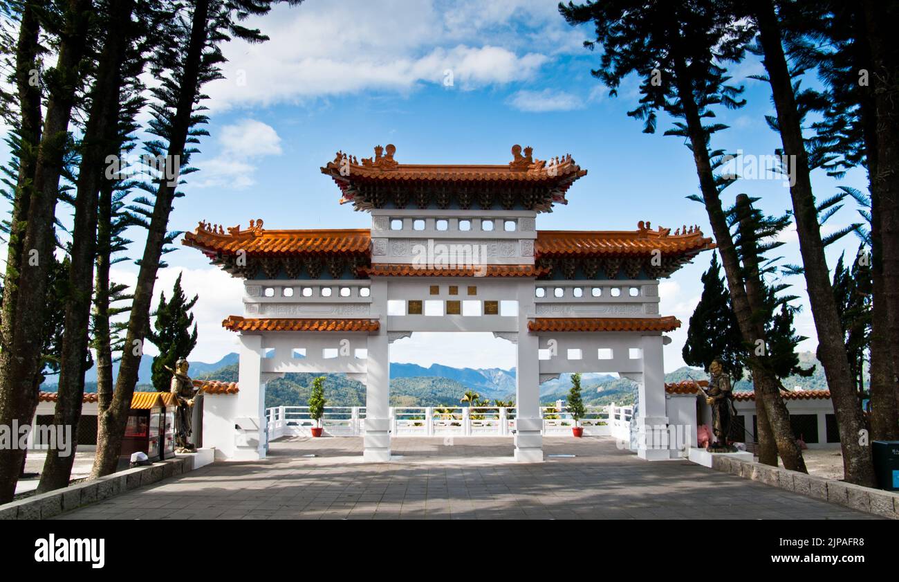 A scenic view of an Asian arch of Xuanzang Temple in China Stock Photo