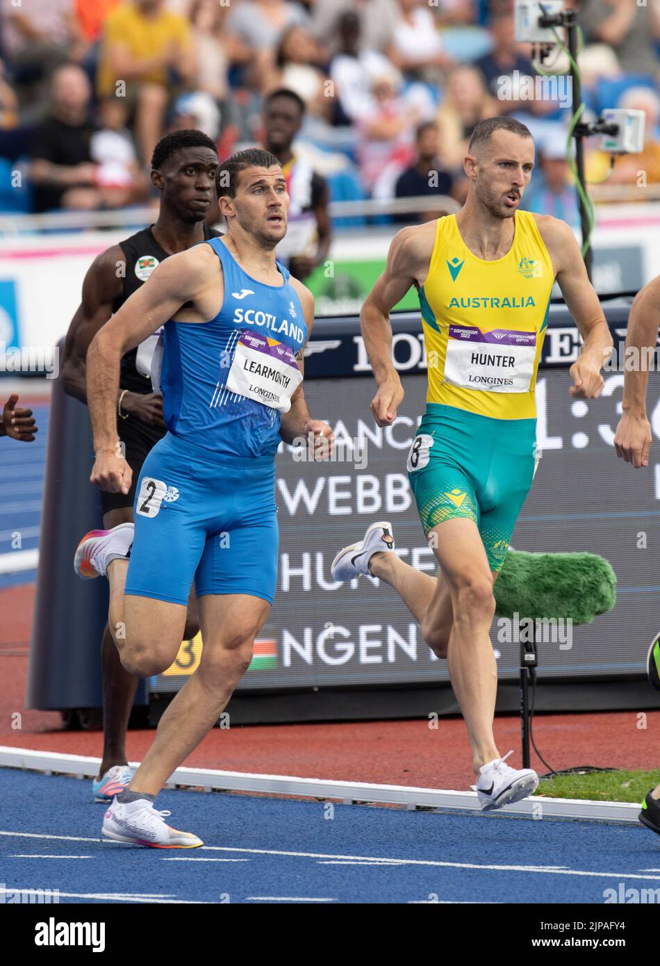 Guy Learmonth of Scotland and Charlie Hunter of Australia competing in the 800m heats at the Commonwealth Games at Alexander Stadium, Birmingham, Engl Stock Photo