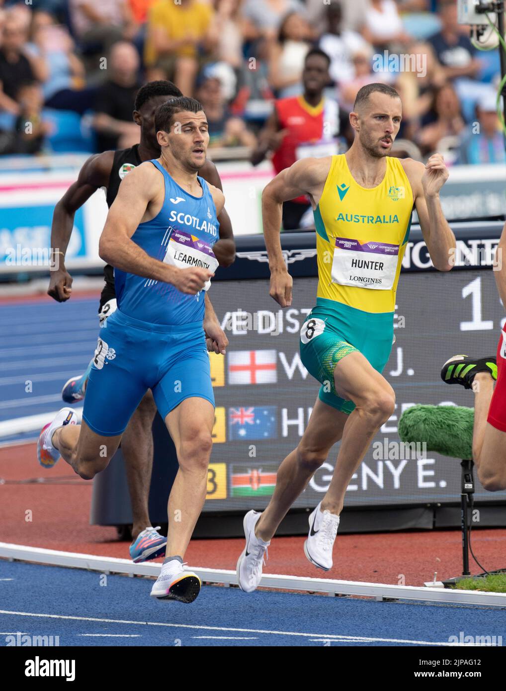 Guy Learmonth of Scotland and Charlie Hunter of Australia competing in the 800m heats at the Commonwealth Games at Alexander Stadium, Birmingham, Engl Stock Photo