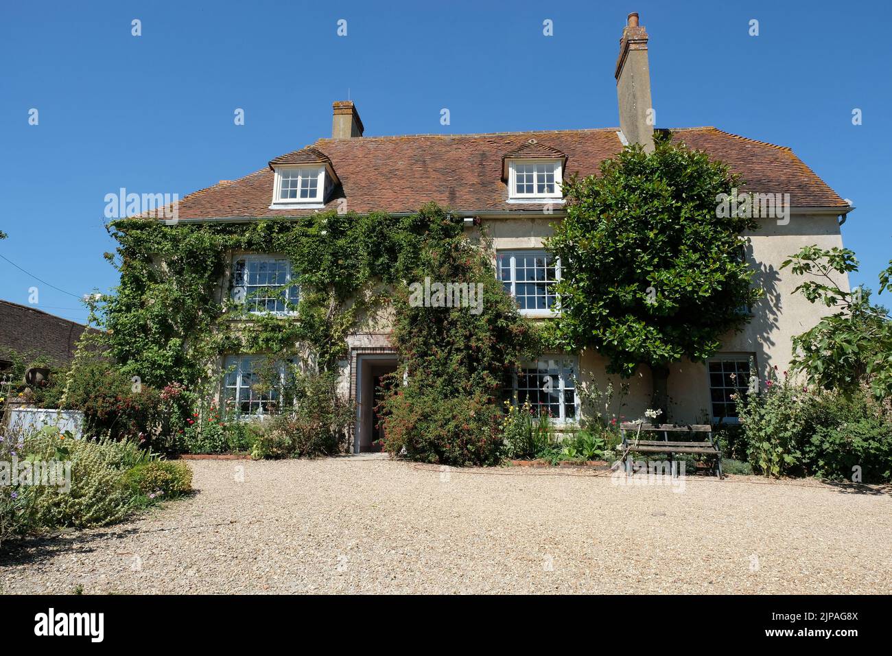 Charleston Farmhouse, near Lewes, East Sussex, England, home of the Bloomsbury Set. It was the country home of Vanessa Bell and Duncan Grant and is an example of their decorative style within a domestic context, representing the fruition of more than sixty years of artistic creativity. Stock Photo
