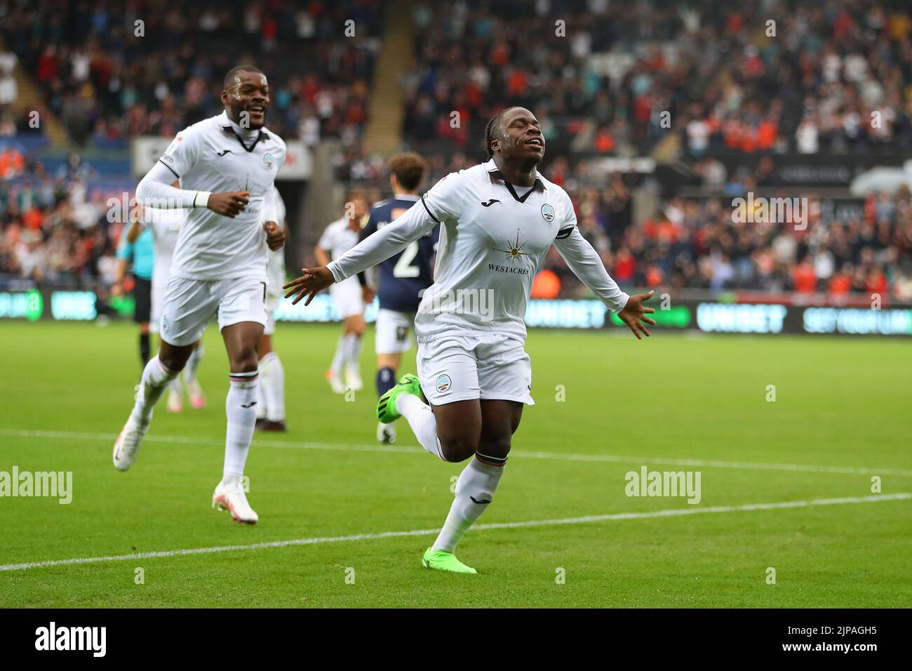 Swansea, UK. 16th Aug, 2022. Michael Obafemi of Swansea city celebrates after he scores his teams 2nd goal. EFL Skybet championship match, Swansea city v Millwall at the Swansea.com Stadium in Swansea, Wales on Tuesday 16th August 2022. this image may only be used for Editorial purposes. Editorial use only, license required for commercial use. No use in betting, games or a single club/league/player publications. pic by Andrew Orchard/Andrew Orchard sports photography/Alamy Live news Credit: Andrew Orchard sports photography/Alamy Live News Stock Photo