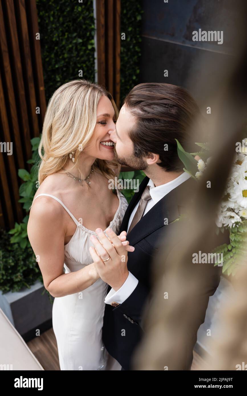 Kissing hands on holiday hi-res stock photography and images - Alamy