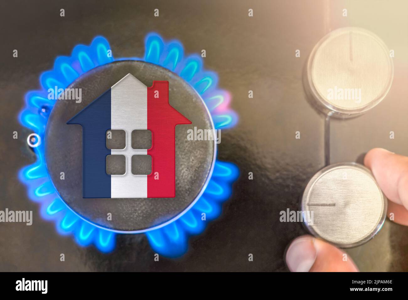 Heating season or gas use in France. Concept, model of a house stands