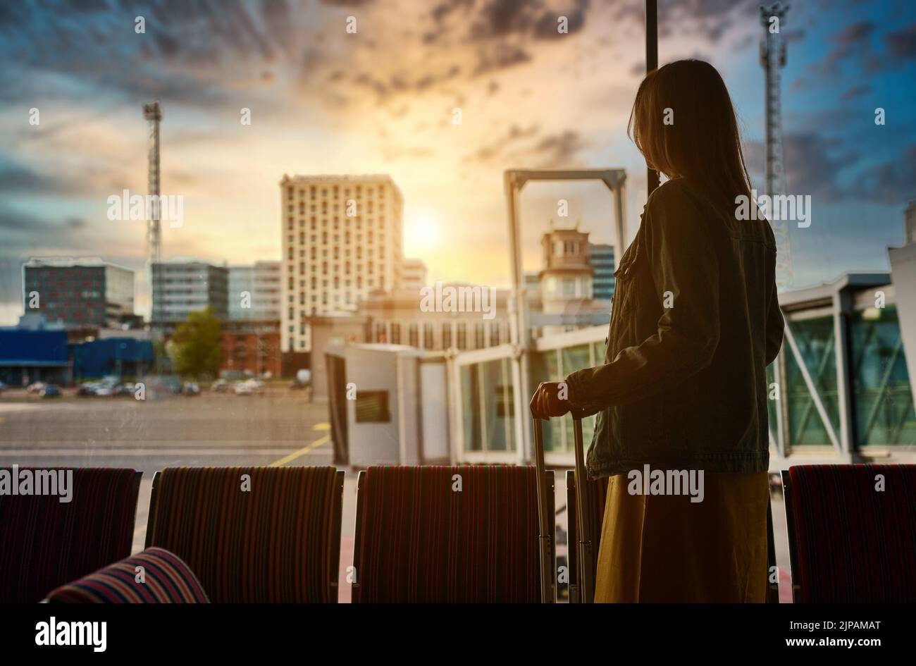 Airport lounge woman suitcase hi-res stock photography and images - Alamy