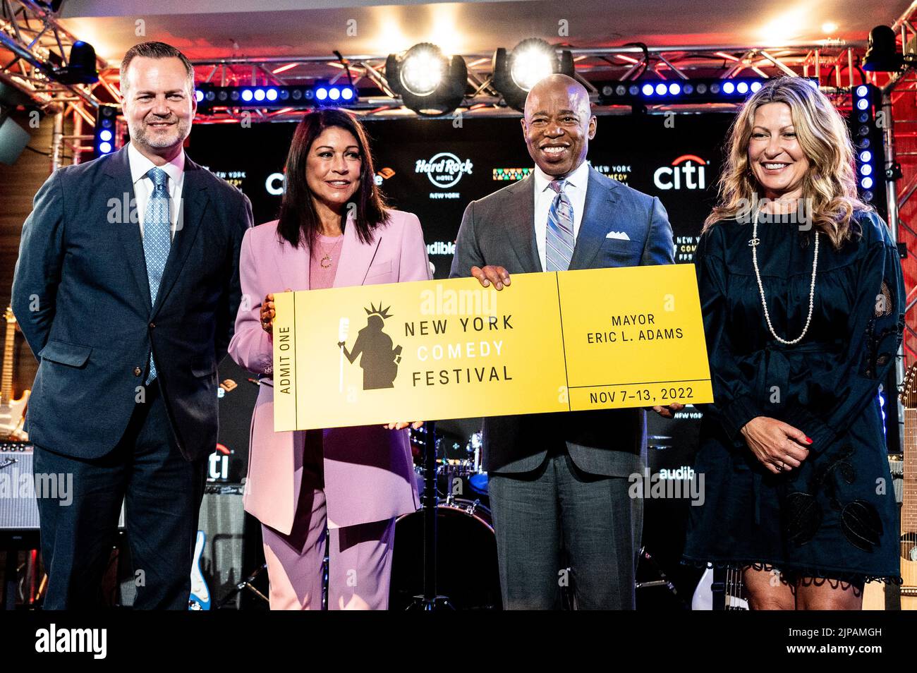 New York City, United States. 16th Aug, 2022. Fred Dixon, President and CEO, NYC & Company, Caroline Hirsch, owner of Carolines on Broadway, and New York City Mayor Eric Adams (D) hold a ticket to announce the annual New York Comedy Festival. Credit: SOPA Images Limited/Alamy Live News Stock Photo