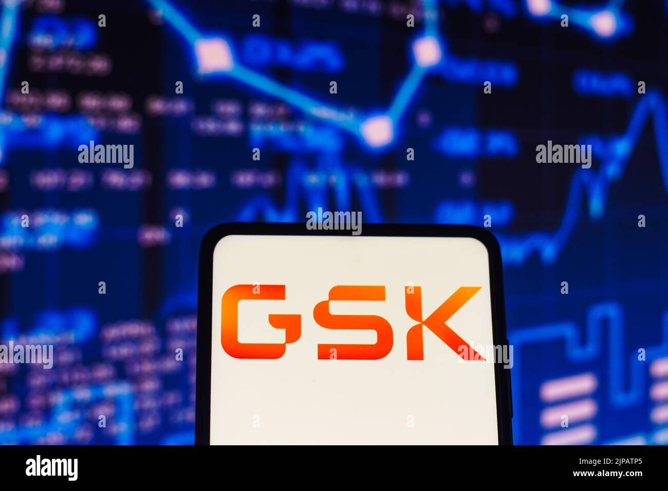 In this photo illustration, the GlaxoSmithKline (GSK) logo seen ...