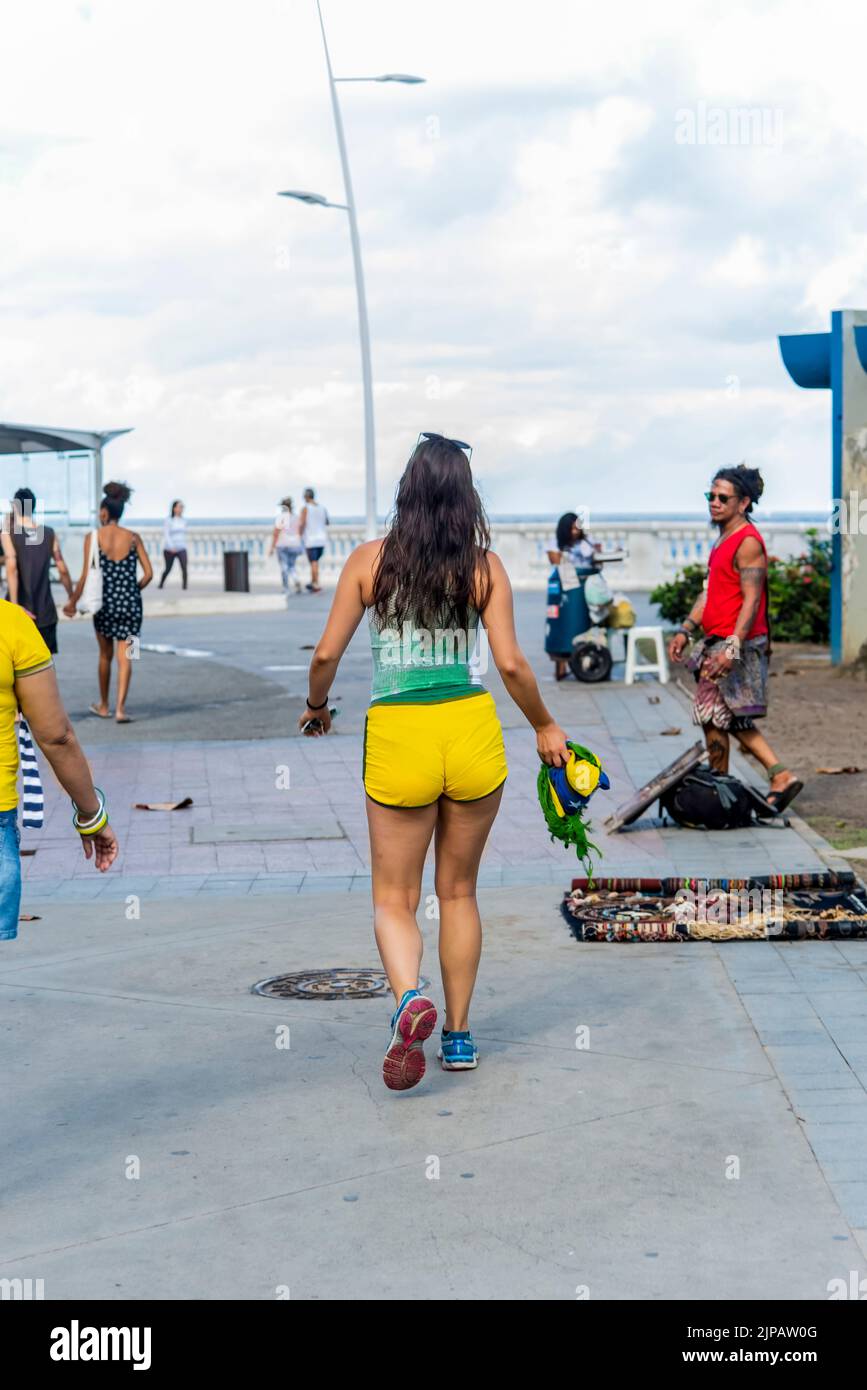 Fans of Brazil walk in the streets of Barra in Salvador, before the match between Brazil versus Costa Rica fo Stock Photo