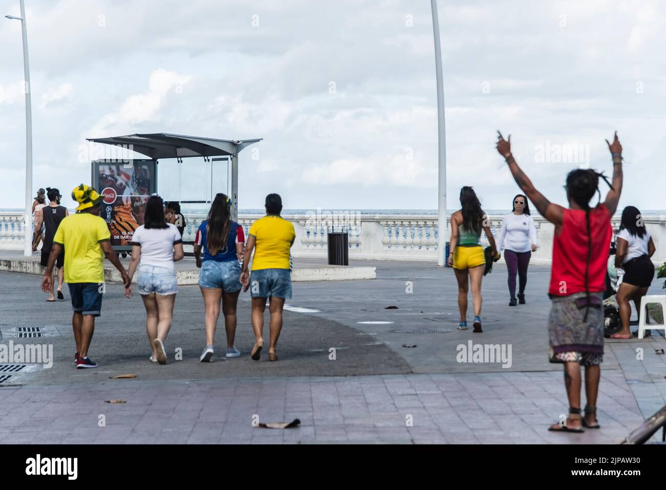 Fans of Brazil walk in the streets of Barra in Salvador, before the match between Brazil versus Costa Rica fo Stock Photo