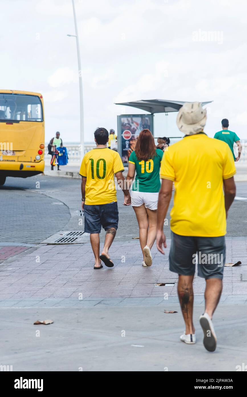 Fans of Brazil walk in the streets of Barra in Salvador, before the match between Brazil versus Costa Rica fo Stock Photo