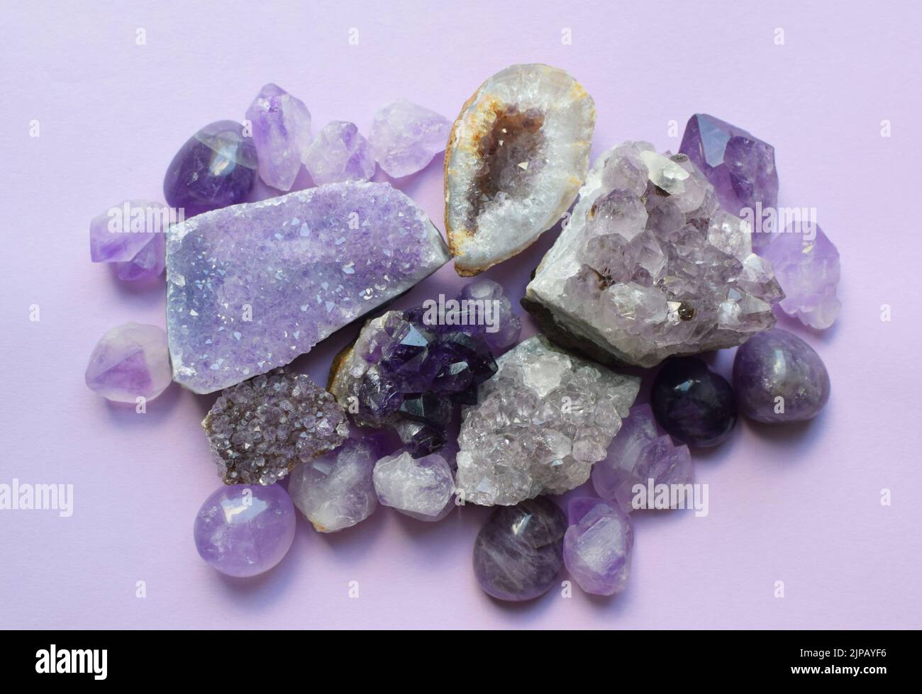 Gemstone minerals on a white background. Round tumbling minerals of ...