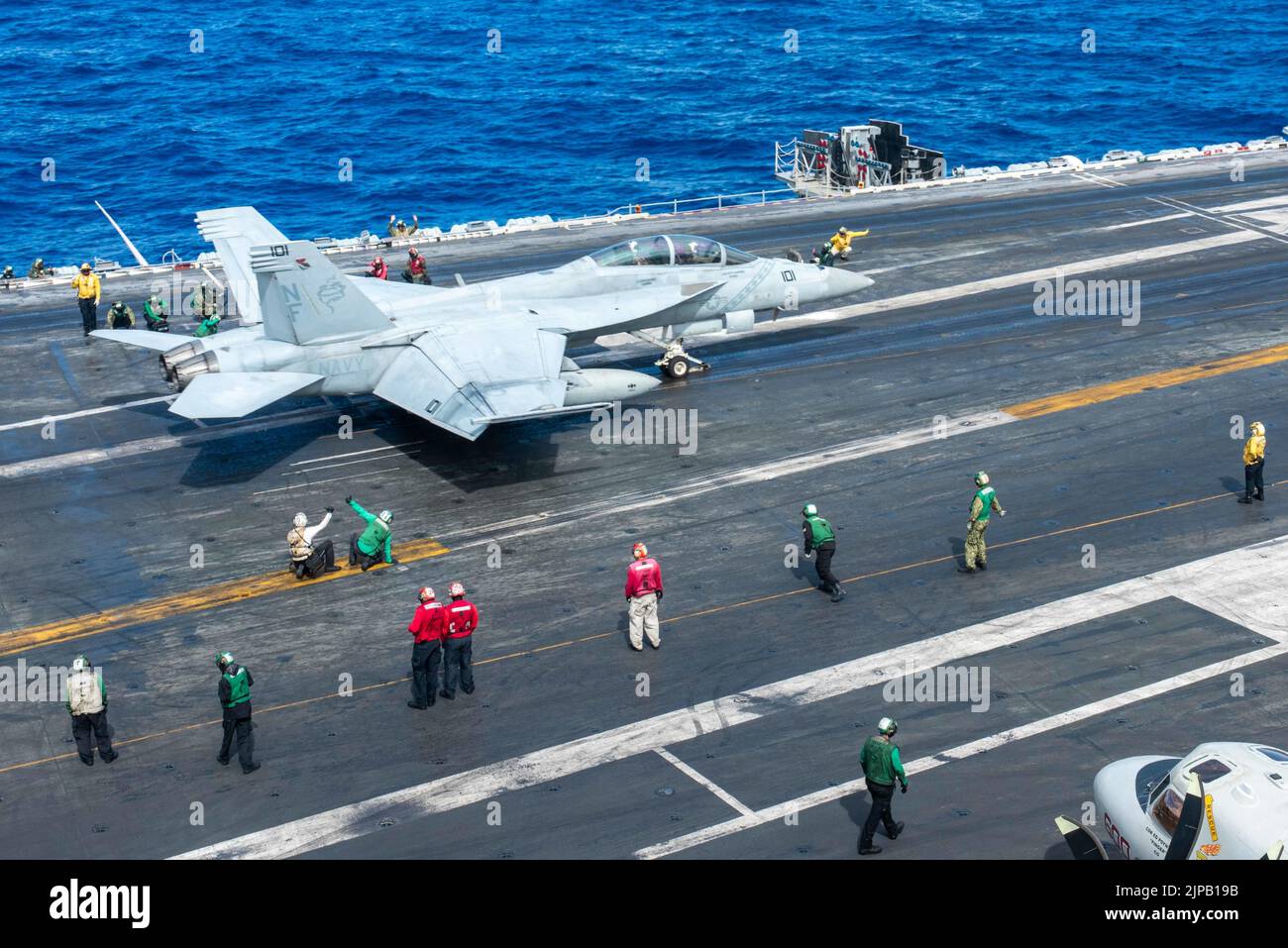 Philippine Sea, United States. 14 August, 2022. A U.S. Navy F/A-18F Super Hornet, attached to the Diamondbacks of Strike Fighter Squadron 102, is given the go for take off from the flight deck of the Nimitz-class aircraft carrier USS Ronald Reagan underway, August 14, 2022 operating on the Philippine Sea. Credit: MC3 Eric Stanton/U.S. Navy/Alamy Live News Stock Photo