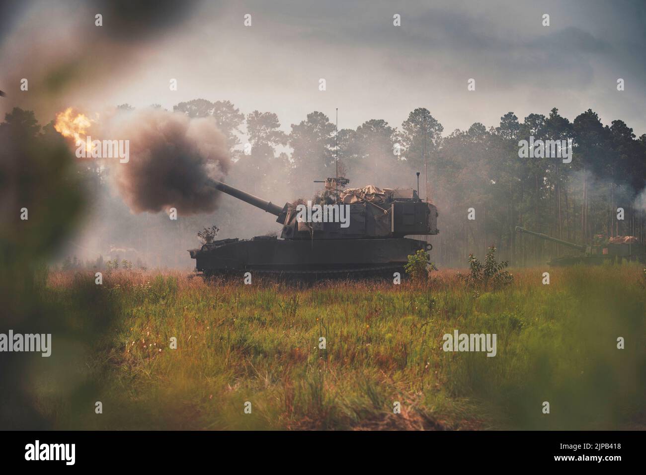 Fort Stewart, Georgia, USA. 10th Aug, 2022. An M109A7 Paladin howitzer from 1st Battalion, 9th Field Artillery Regiment, 2nd Armored Brigade Combat Team, 3rd Infantry Division, fires during Artillery Table XV. The role of the field artillery is to destroy, defeat, or disrupt the enemy with integrated fires to enable maneuver commanders to dominate in unified land operations. To do this, the field artillery must remain a ready, worldwide deployable force able to dominate any operating environment through the integration, synchronization, and employment of organic, joint, and multinational fi Stock Photo