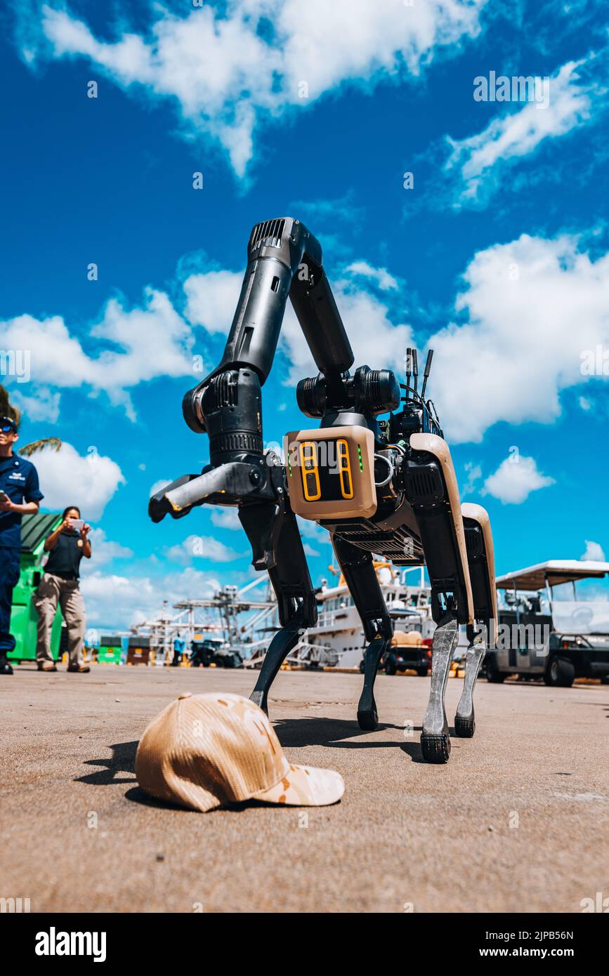 The U.S. Coast Guard performs a demonstration on how they utilize a droid to combat the distribution of Weapons of Mass Destruction at the U.S. Coast Guard Base on Oahu, Hawaii, August 12, 2022. The demonstration showcased a step-by-step breakdown of the process of locating, removing, and decontaminating the specimen and service members. (U.S. Army Photo by Sgt. Gary Singleton) Stock Photo