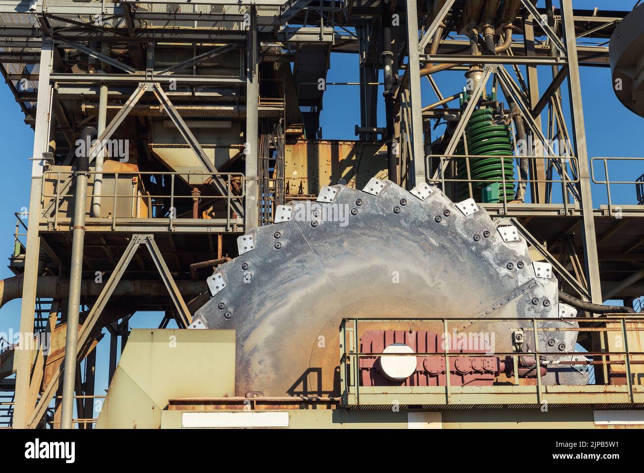 Closeup detail part of heavy metal construction of open pit gravel