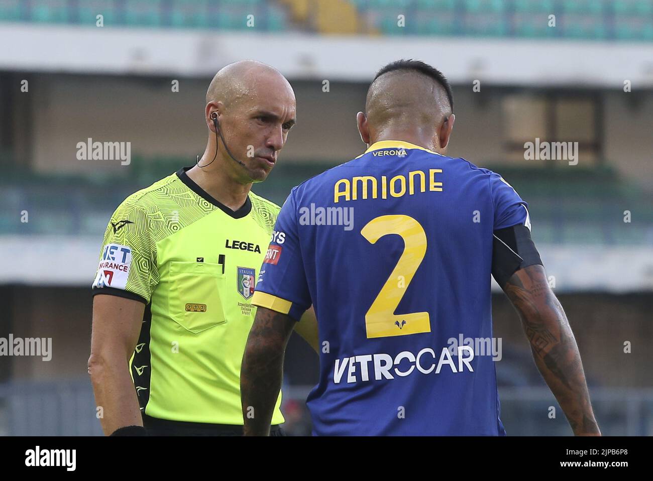 Verona, Italy. 15th Aug, 2022. Referee Micheal Fabbri speaks to Bruno Amione of Hellas Verona FC during Hellas Verona vs SSC Napoli, 1Â° Serie A Tim 2022-23 game at Marcantonio Bentegodi Stadium in Verona, Italy, on August 15, 2022. Credit: Independent Photo Agency/Alamy Live News Stock Photo