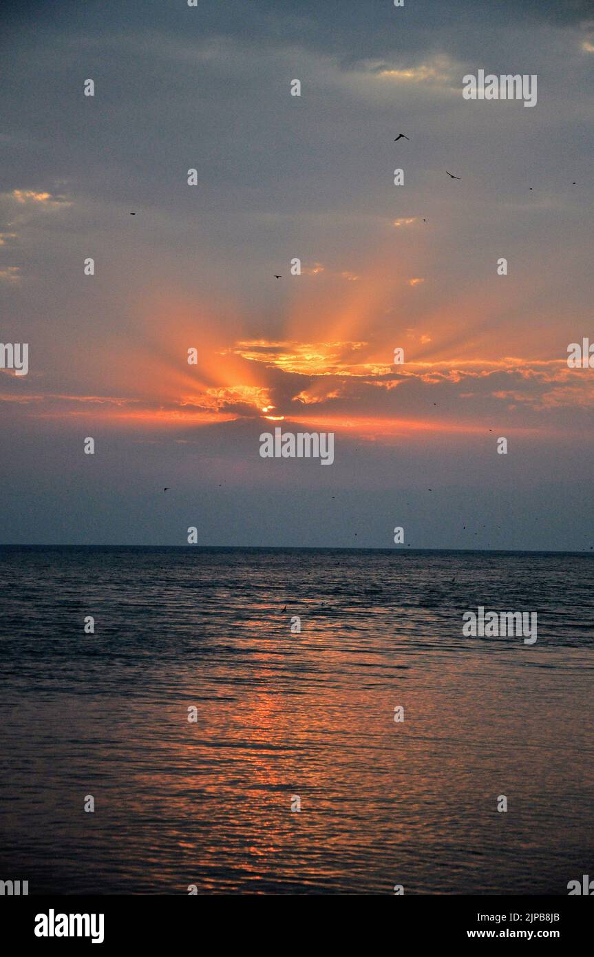 A vertical shot of the beautiful Sevan lake during sunset in Armenia - perfect for background Stock Photo