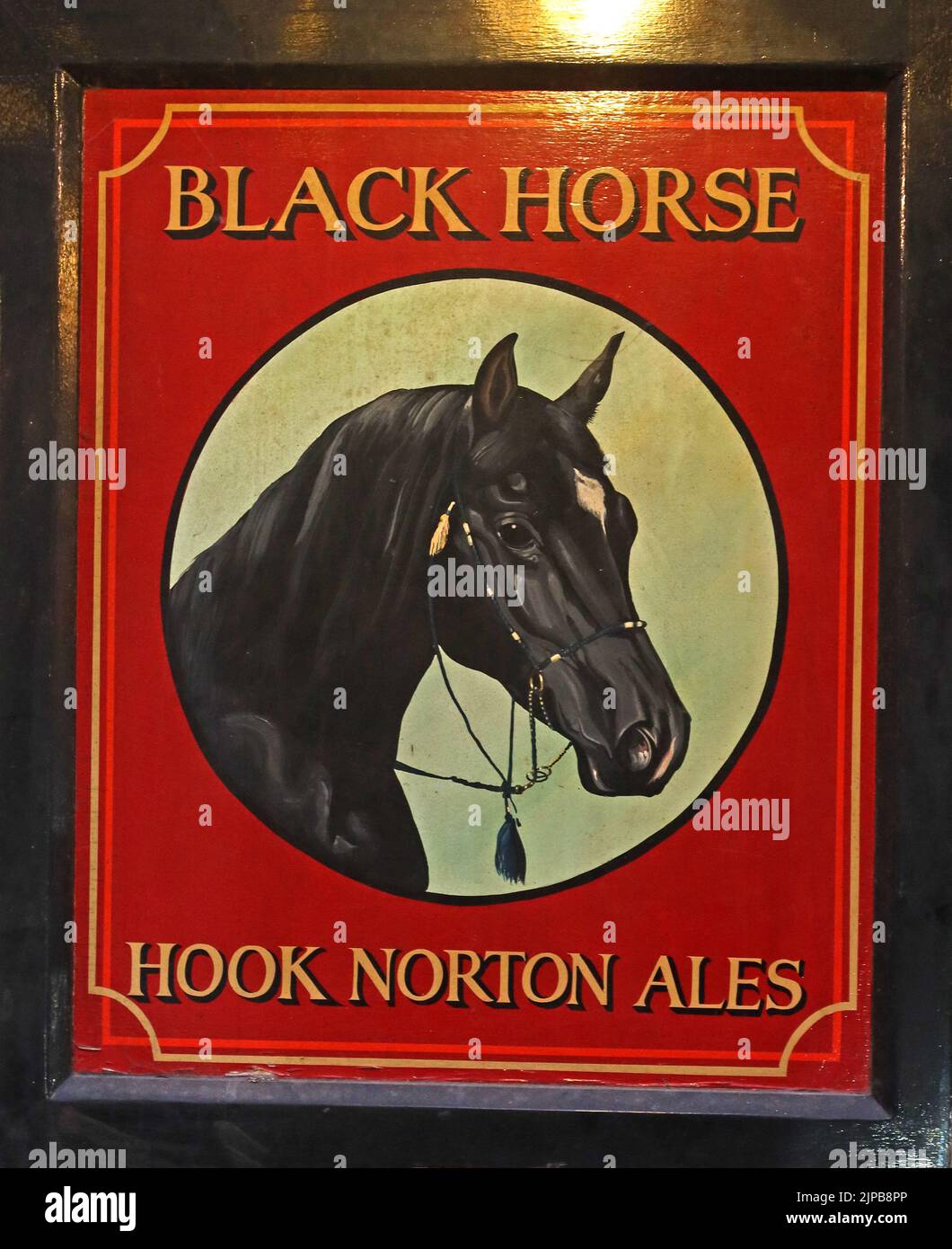 The Black Horse - Hook Norton Ales classic pub sign, Oxfordshire craft ales, Hook Norton, Banbury, Oxen, England, UK,  OX15 5NY Stock Photo