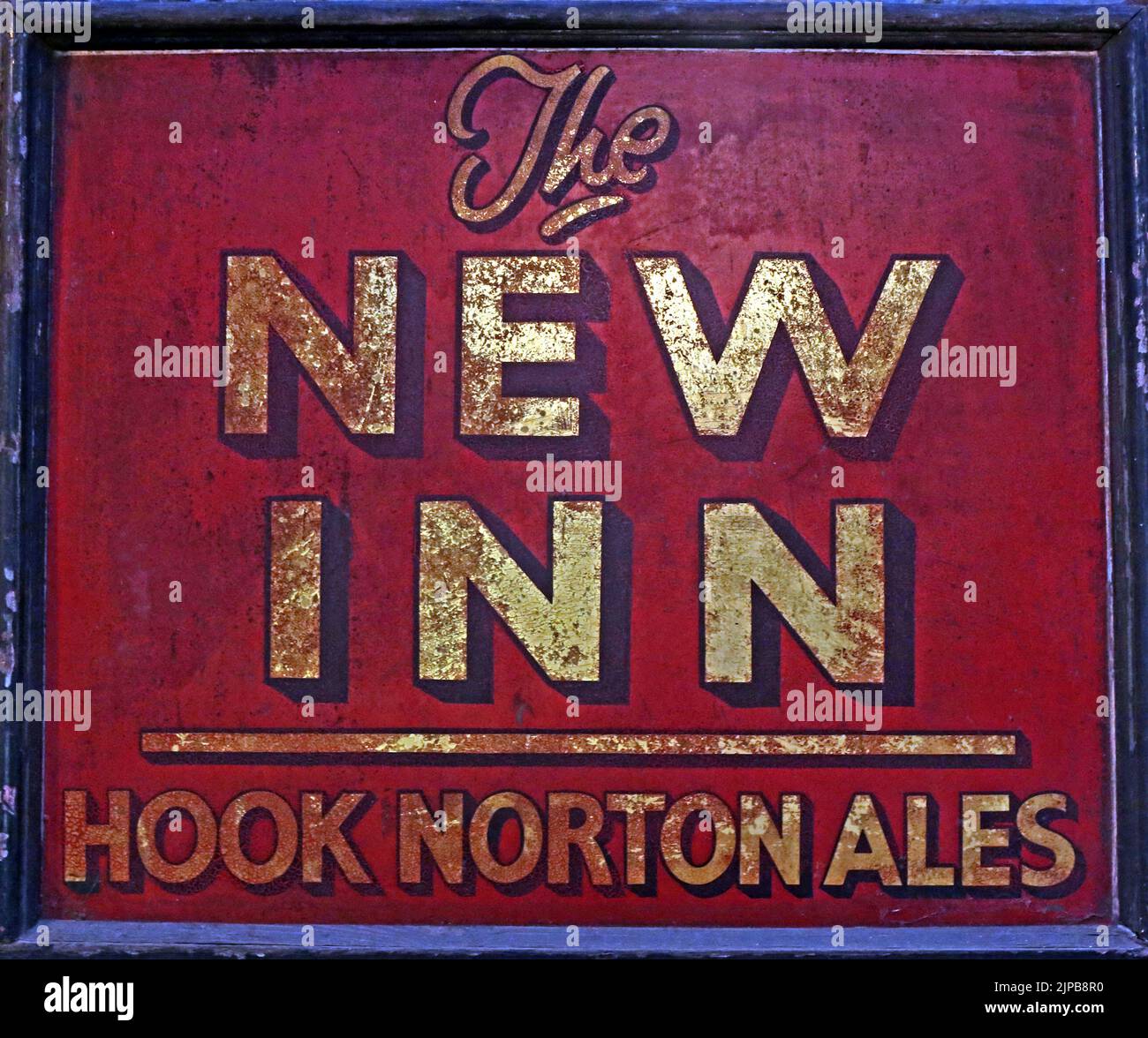 The New Inn - Hook Norton Ales classic pub sign, Oxfordshire craft ales, Hook Norton, Banbury, Oxen, England, UK,  OX15 5NY Stock Photo