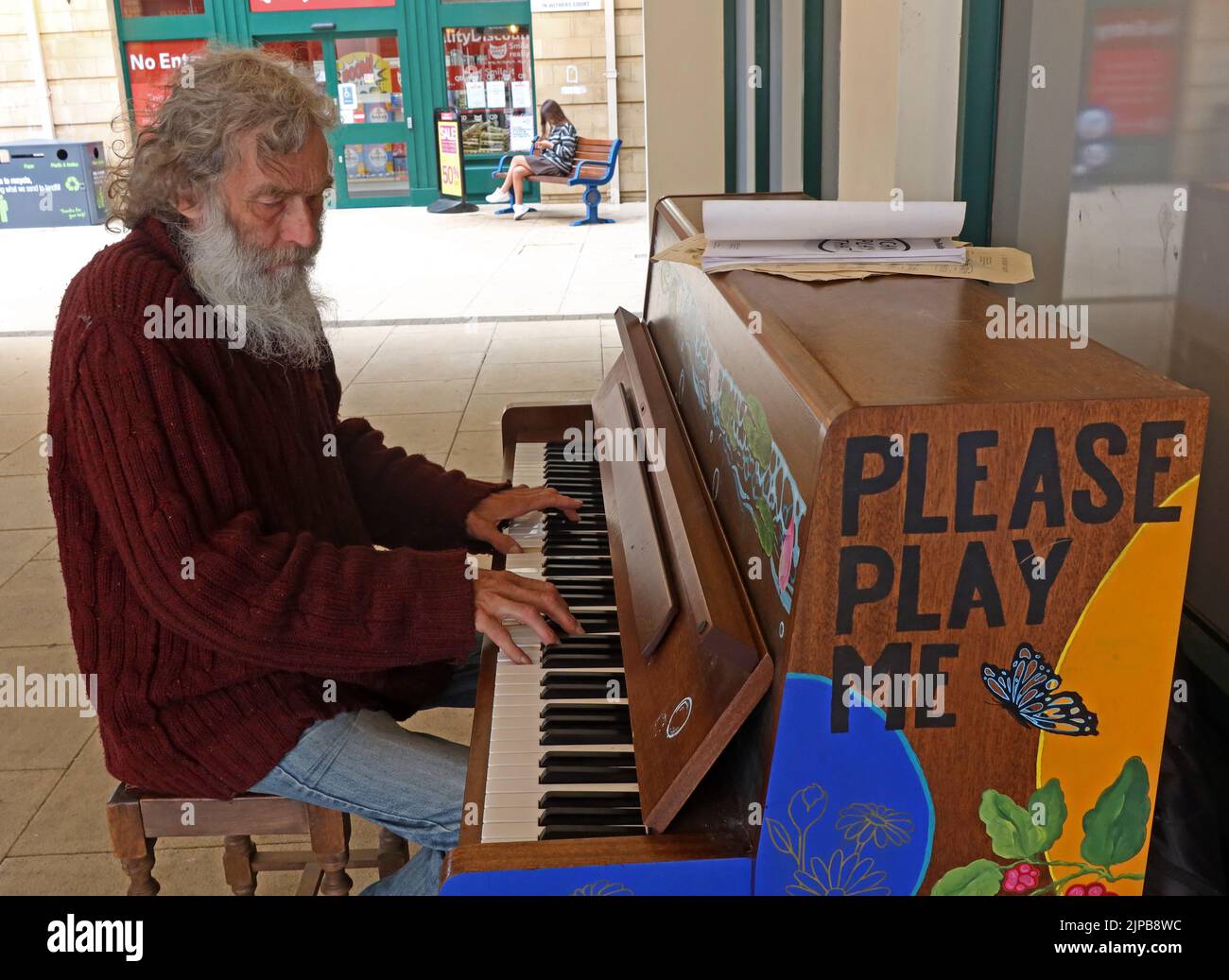 Public Community Piano,provided to play-Please Play Me, at West Street, Chipping Norton, West Oxfordshire, Oxfordshire, South East England,UK,OX7 5LH Stock Photo