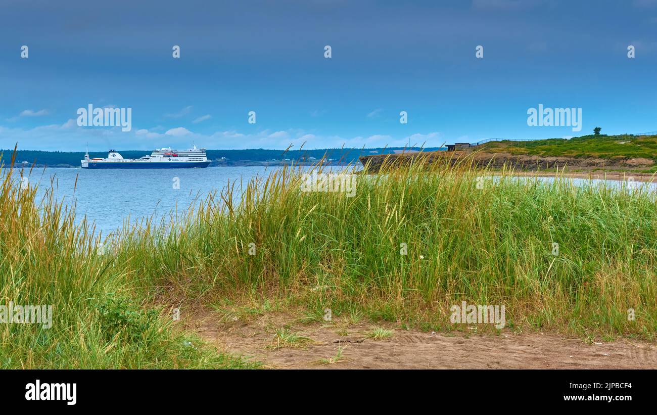 Marine Atlantic ferry returning from Newfoundland to port in North Sydney Nova Scotia photographed from a vantage point on Lockman's Beach. Stock Photo