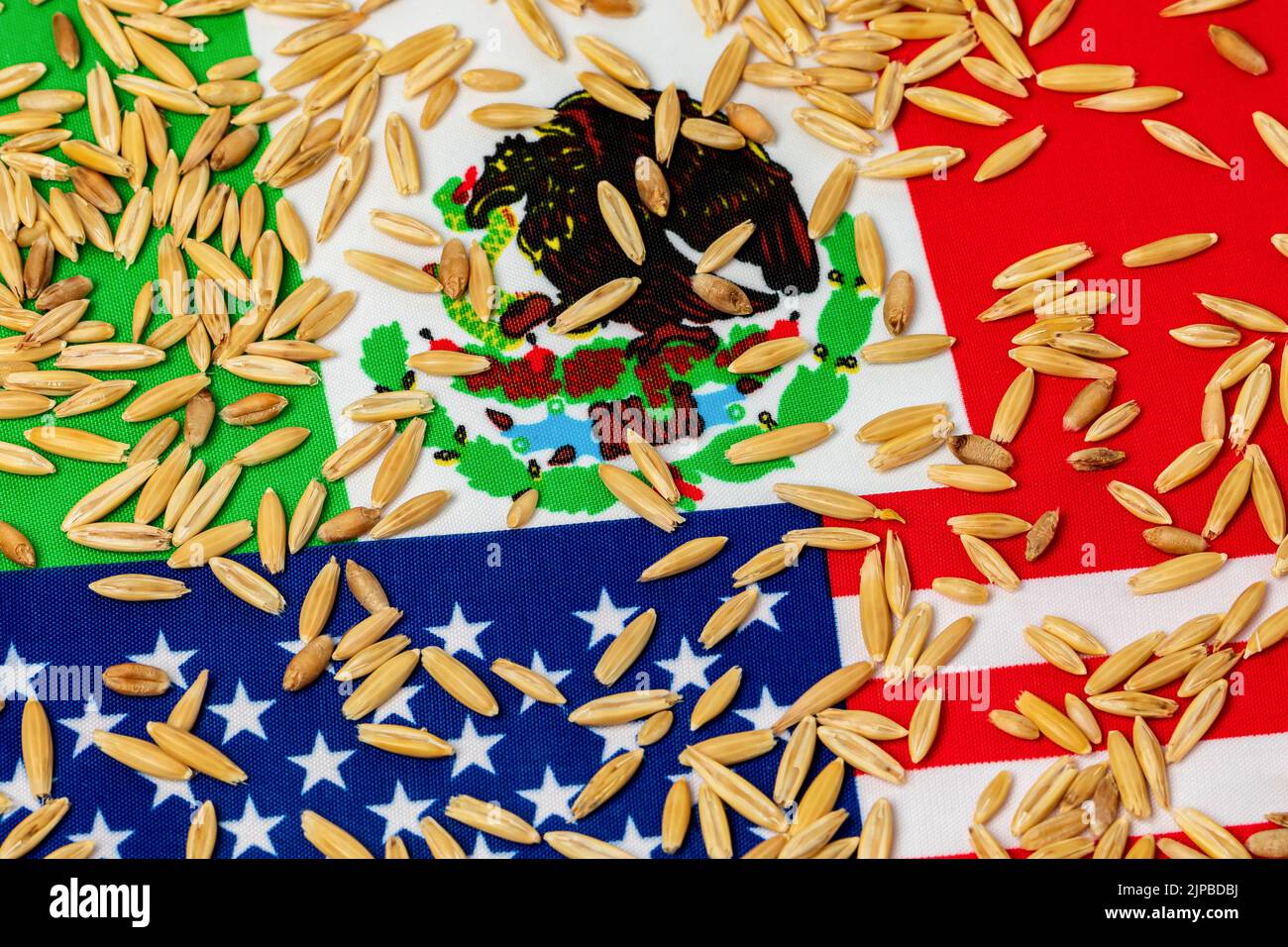 United States of America, Mexico flags and oats. Oat trade agreement, imports and exports concept. Stock Photo