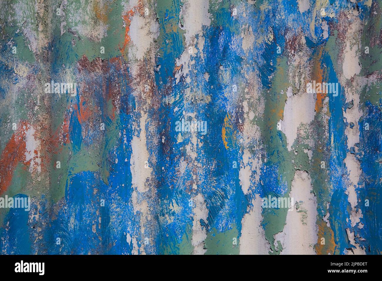 Peeling paint on corrugated metal siding, Quebec, Canada Stock Photo