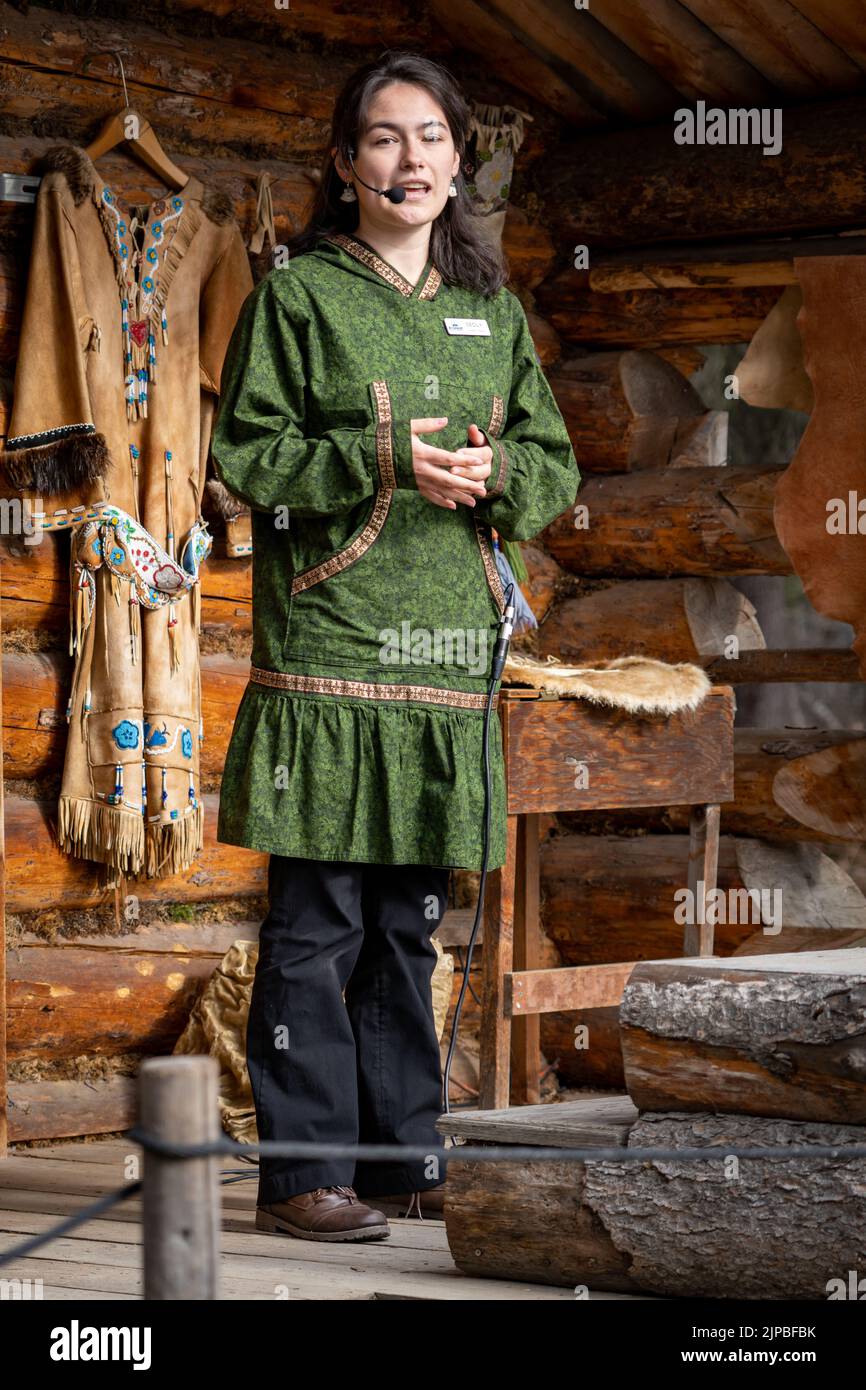 An Athabaskan Girl poses in native costume at the Chena Indian Village