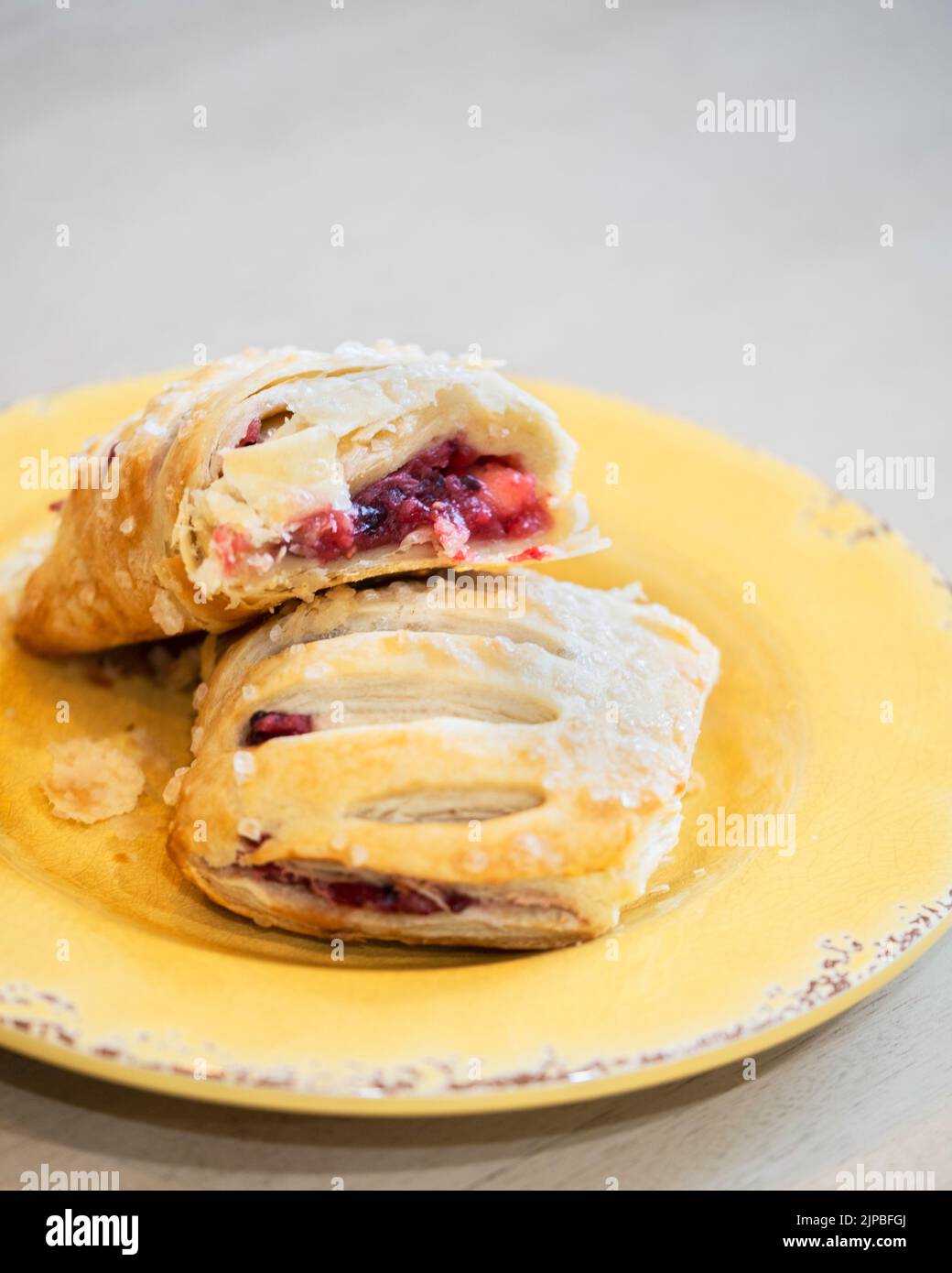 Aldi-offered baked Fruits of the Forest Strudel with apples and a variety of berries for a filling. Wichita, Kansas, USA. Stock Photo