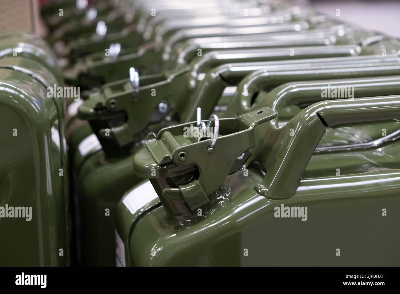 New green iron gas can in the hardware store. Fuel Tank for