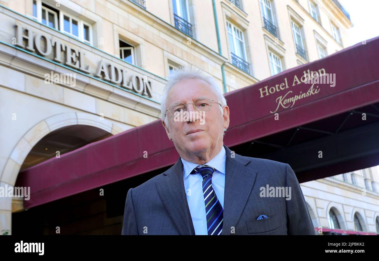 Berlin, Germany. 08th Aug, 2022. Anno August Jagdfeld, investor and owner of the Hotel Adlon, stands in front of the entrance to the luxury hotel. Opened in 1907 in imperial times. Exuberant parties in the Golden Twenties. The Hotel Adlon was the scene of history. With its reopening, it has written history itself. (to dpa KORR.: 'Luxury hotel and landmark - 25 years Hotel Adlon') Credit: Wolfgang Kumm/dpa/Alamy Live News Stock Photo