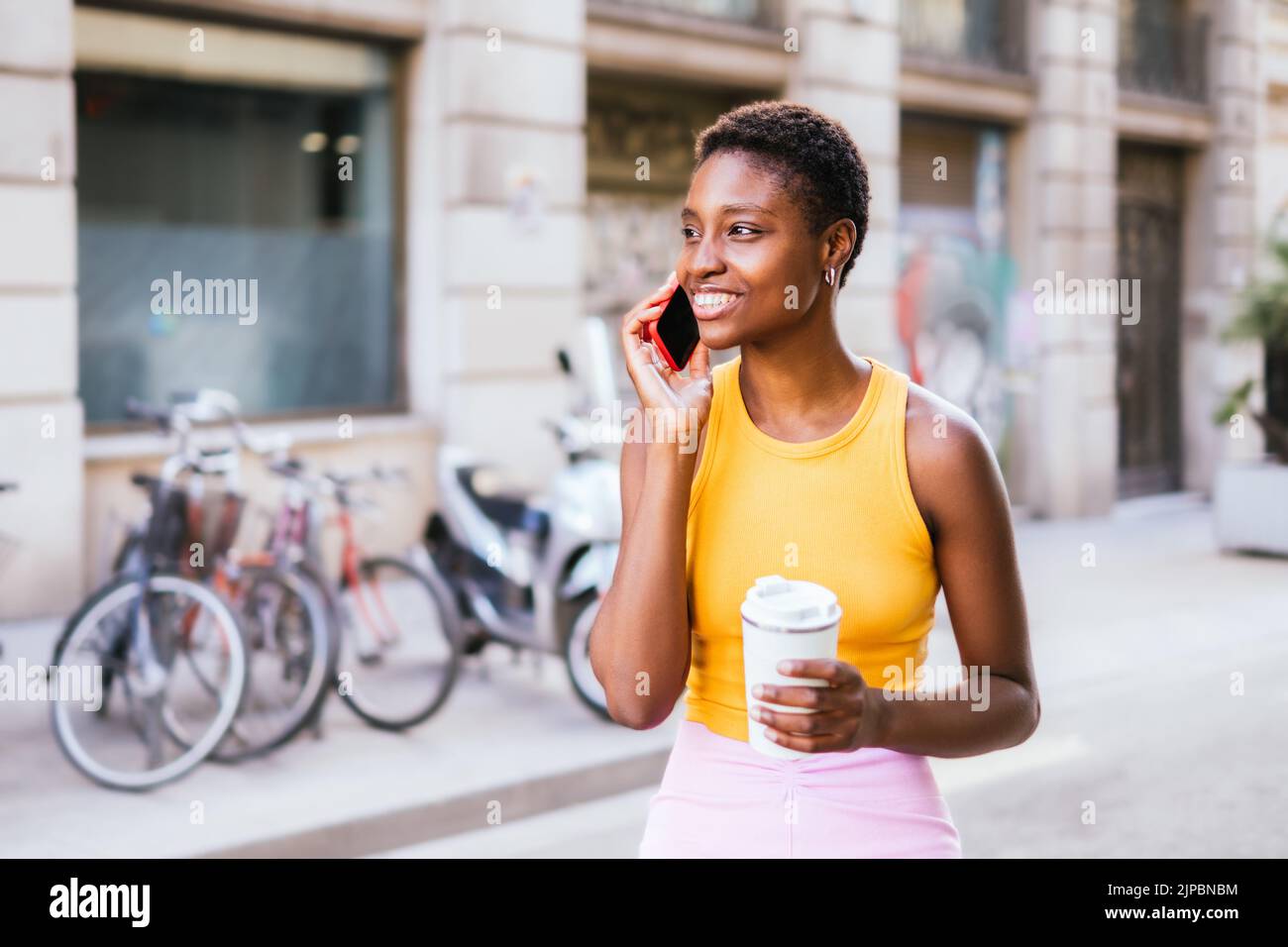 African woman walking hi-res stock photography and images - Alamy