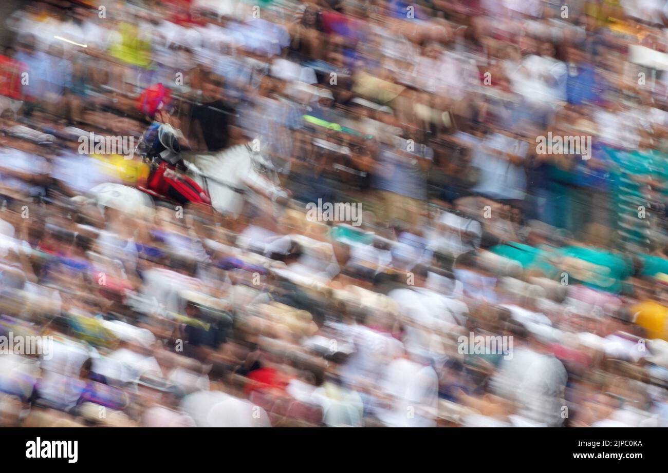 Siena, Italy. 16th Aug, 2022. An Italian Carabinieri performs before the suspension of the horse race Palio in Siena, Italy, Aug. 16, 2022. The horse race Palio has been postponed to Aug. 17 due to the rain. The historical horse race Palio is held again this year after a two-year pause because of the COVID-19 pandemic. Credit: Jin Mamengni/Xinhua/Alamy Live News Stock Photo