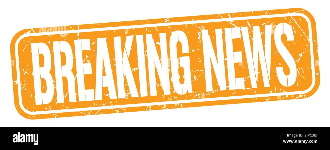 BREAKING NEWS text written on orange grungy stamp sign Stock Photo - Alamy